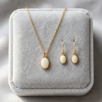 Illustrative gold-tone women's pendant necklace and matching earrings set