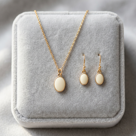 Illustrative gold-tone women's pendant necklace and matching earrings set